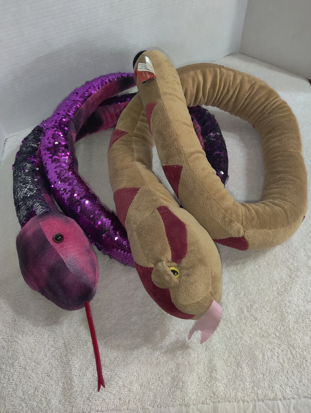 Set Of Two Adventure Planet Plush Toys.
